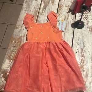 Cute organize-ish dress with flowers on the top and flowy